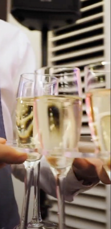 3 champaign glasses touching